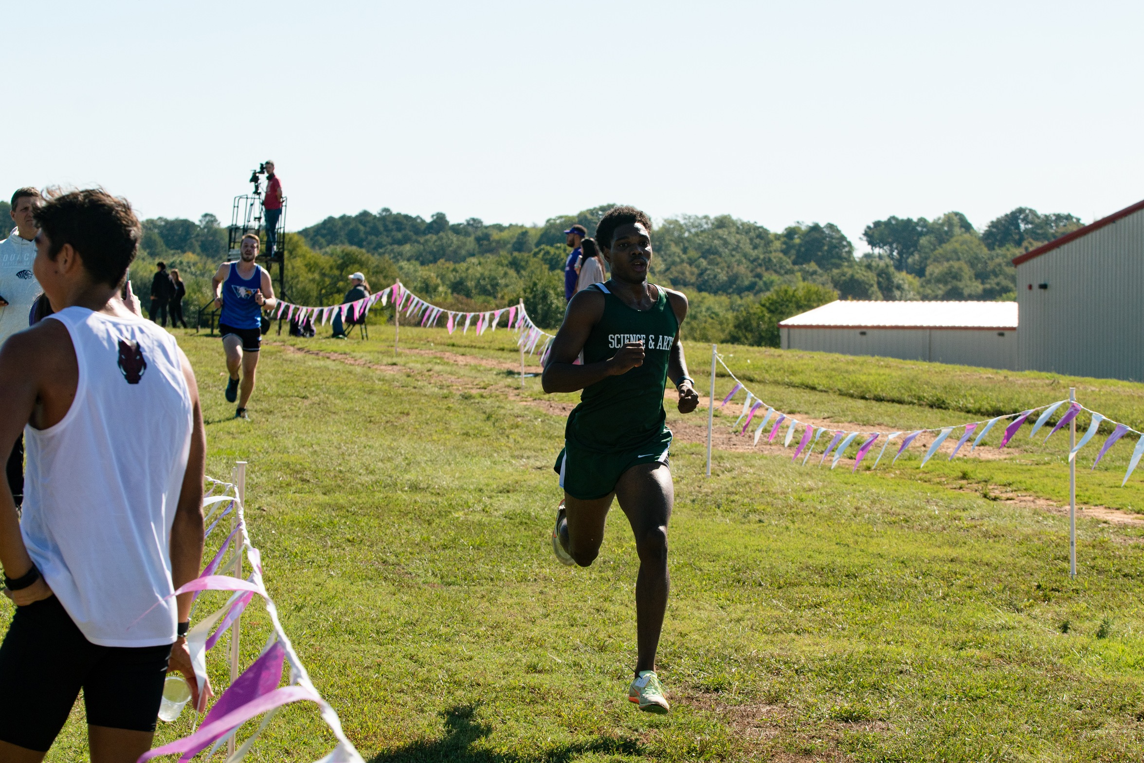 Aaron simon crosses the finish line.